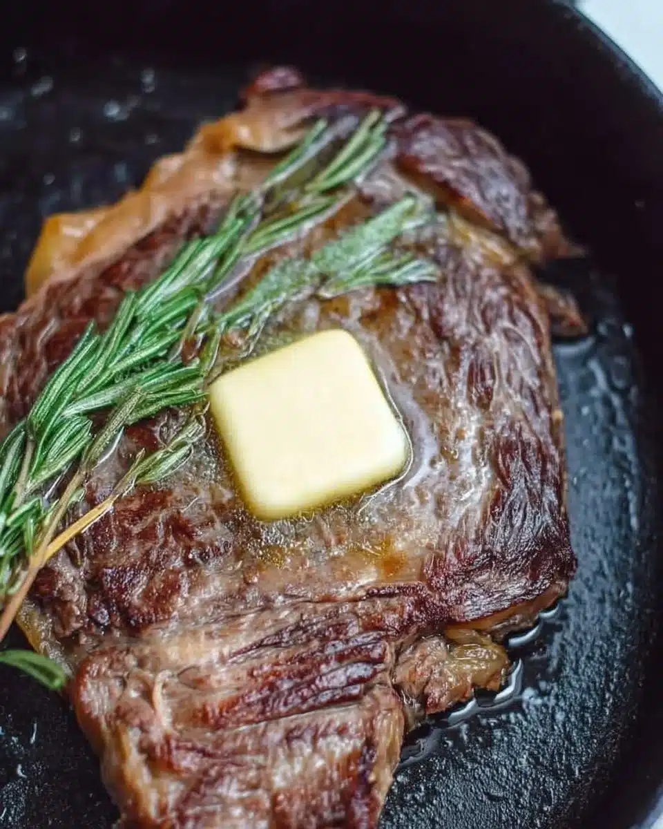 Sous Vide Ribeye Steak Recipe 1 Perfectly cooked sous vide ribeye steak on a cutting board